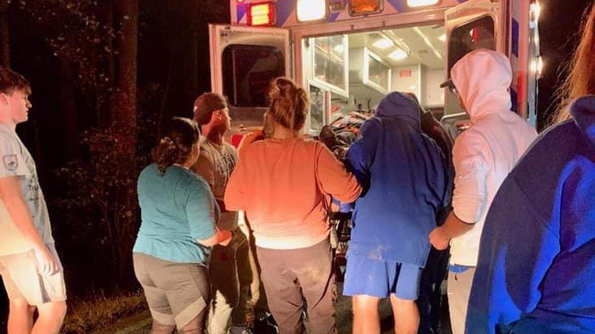 Jackson County High School football officials posted this photo on social media along with details of team members stopping to help a wreck victim on Oct. 22.