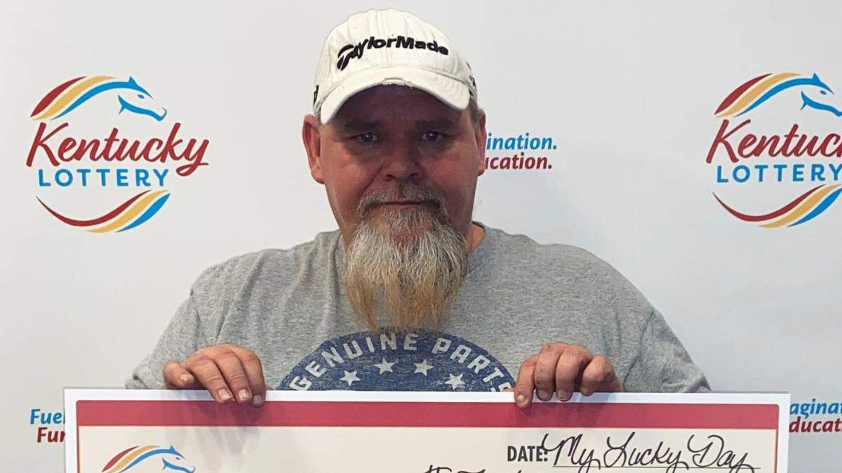 Troy Kimmel with his big $75,000 check. After taxes, he took home $53,625.