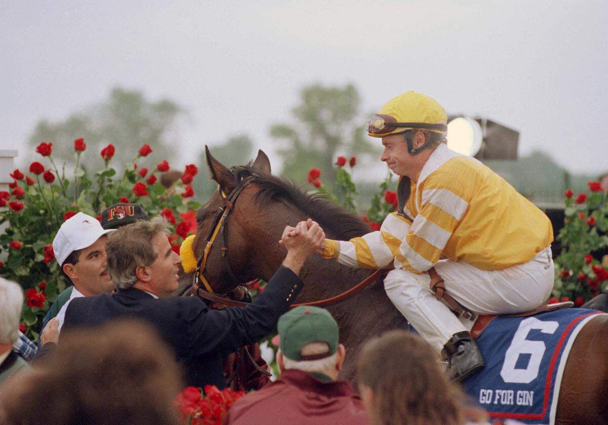 Jockey Chris McCarron, aboard Go for Gin, was congratulated by trainer Nick Zito after winning the 120th running of the Kentucky Derby on May 7, 1994.