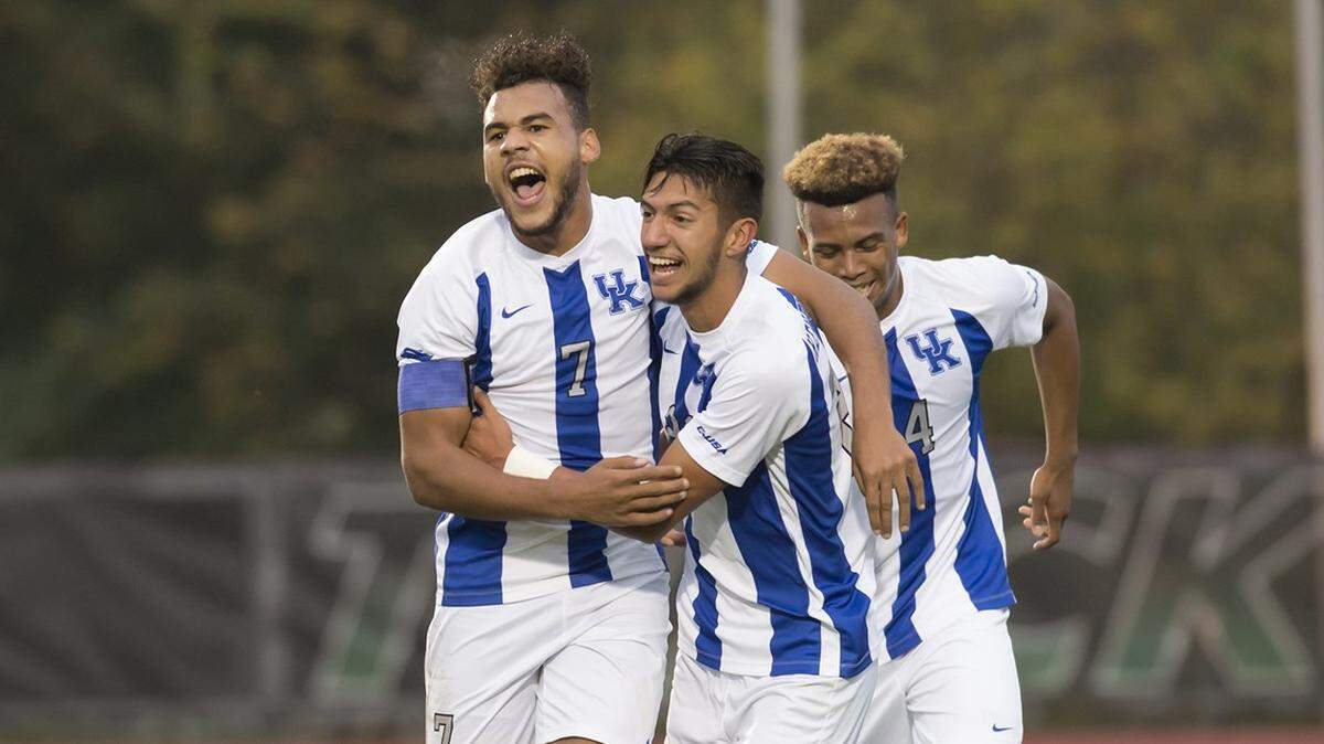 Kentucky’s Kalil ElMedkhar (center), JJ Williams (left) and Daniel Evans celebrated during the team’s 2-1 win over Marshall in the Conference USA Tournament in 2018. On Thursday it was announced ElMedkhar had signed with Major League Soccer’s FC Dallas. 
