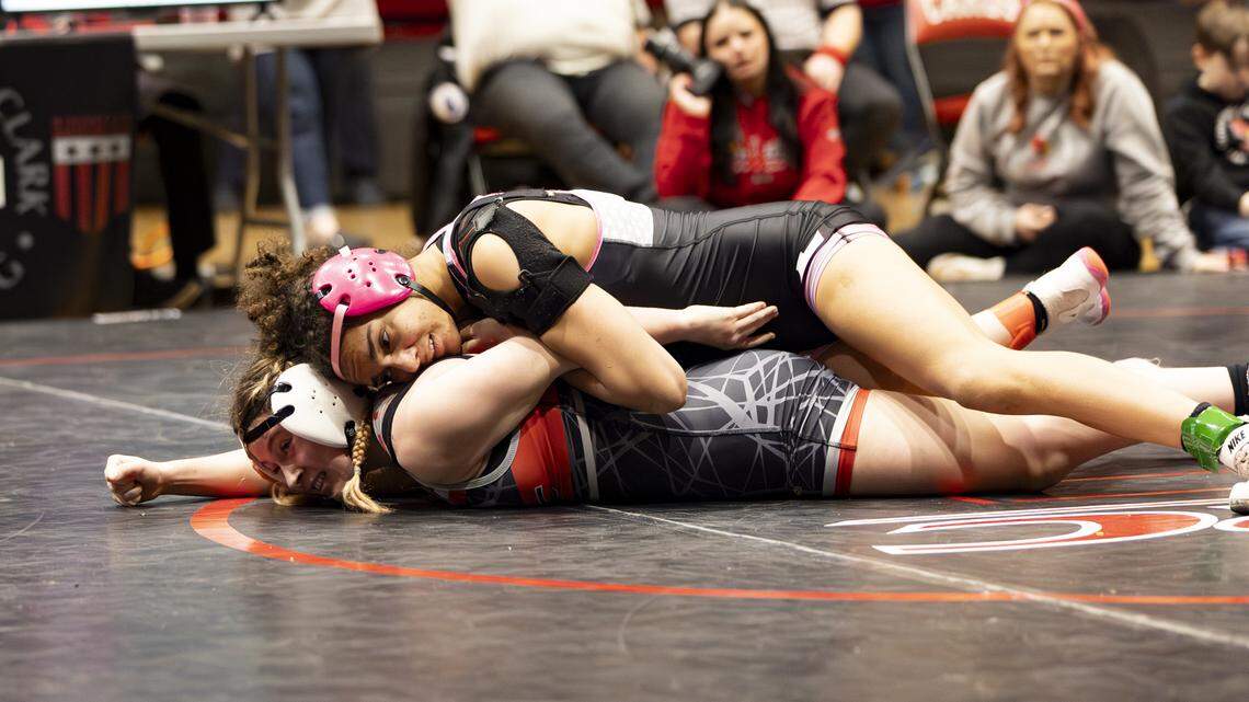 Lafyayette’s Aaliyah Davis holds George Rogers Clark’s Bailey Fletcher to the mat during the 120 finals at the KHSAA Girls Region 3 Wrestling Championships at Robert D. Campbell Jr. High in Winchester on Saturday.