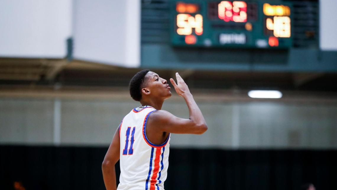 Frankfort High School senior guard Jordan Blythe gestures to fans during Friday night’s win at Kentucky State University. Blythe led all scorers with 20 points.