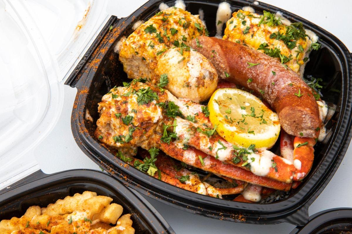 The snowcrab boil at Seafood Lady at 833 Georgetown Street in Lexington, Ky., on Thursday, Aug. 28, 2020. The carryout restaurant features Cajun-style seafood boils with lobster, oysters, crabs, shrimp, fish, Southern seafood, plus po’boys and more.