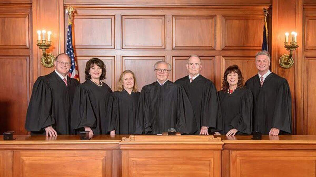 The Kentucky Supreme Court with Chief Justice John D. Minton Jr. is photographed with the addition of Justice Robert B. Conley, Tuesday, June 8, 2021, in the Supreme Court Courtroom in Frankfort, Ky. (AOC Photo/Brian Bohannon)