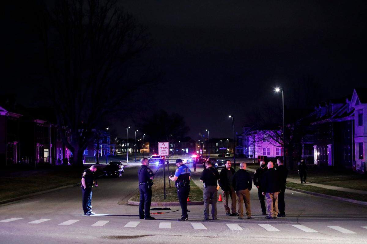 Lexington police investigate the scene of a shooting near the intersection of Nelson Street and Triple Crown Parkway in Lexington, Ky., Thursday, March 11, 2021. At least two people were transported from the scene with gunshot wounds.