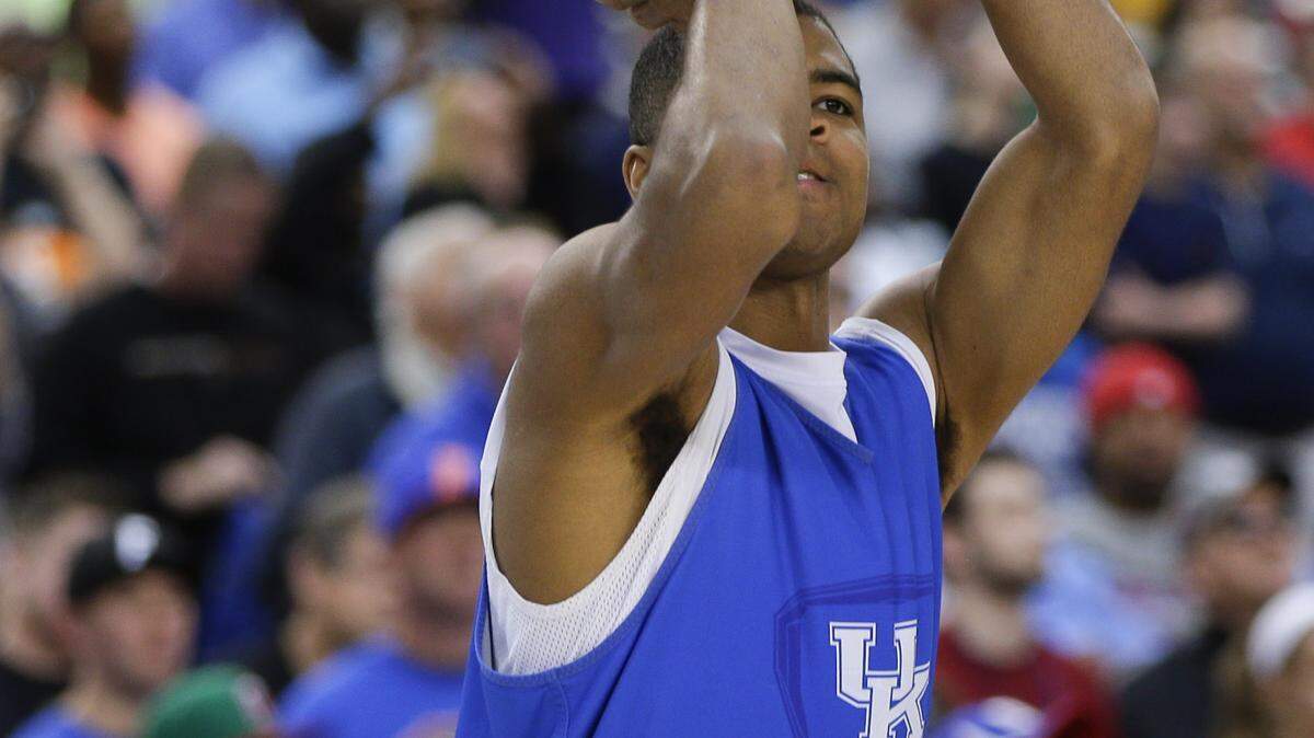 Kentucky Wildcats guard Aaron Harrison (2) eyed a baseline jumper  as Kentucky practiced in AT&T Stadium  on Friday April 4, 2014 in  Dallas, TX. Photo by Mark Cornelison | Staff