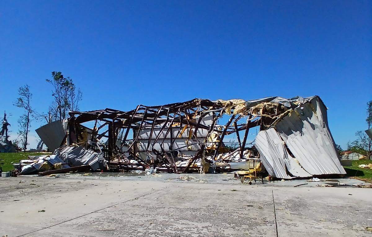 A helicopter and trucks were buried in a collapsed hangar at the London-Corbin Airport after severe overnight storms and a presumed tornado Saturday, May 17, 2025.