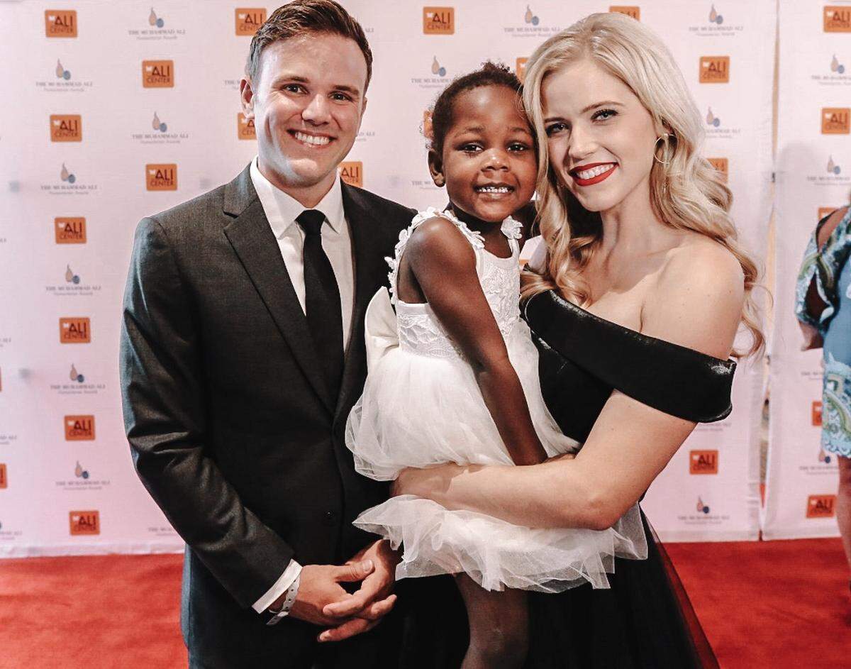 Amy Hehre, a University of Kentucky graduate who grew up in Somerset, received a Muhammad Ali Humanitarian Award for Global Citizenship last fall. She and her husband, Robert Hehre, co-founded OVI Children’s Hospital in Migori, Kenya. They’re shown here at the Louisville awards with their daughter, Lily.