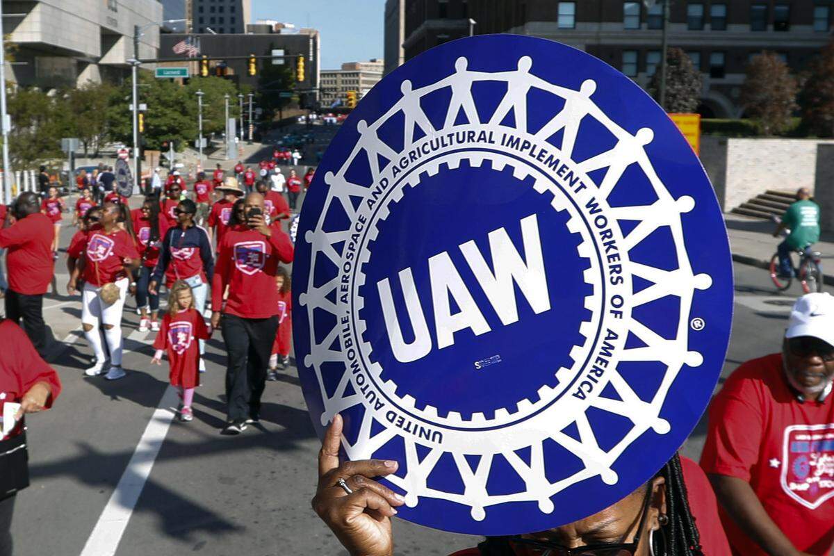 United Auto Workers members walk in the Labor Day parade, Sept. 2, 2019, in Detroit. The United Auto Workers union announced plans Wednesday, Nov. 29, 2023, to try to simultaneously organize workers at more than a dozen nonunion auto factories including TMMK in Georgetown.