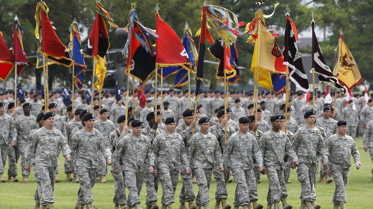 Troops take part in a ceremony on Friday, Aug. 17, 2012, at Fort Campbell, Ky. (AP Photo/Mark Humphrey)