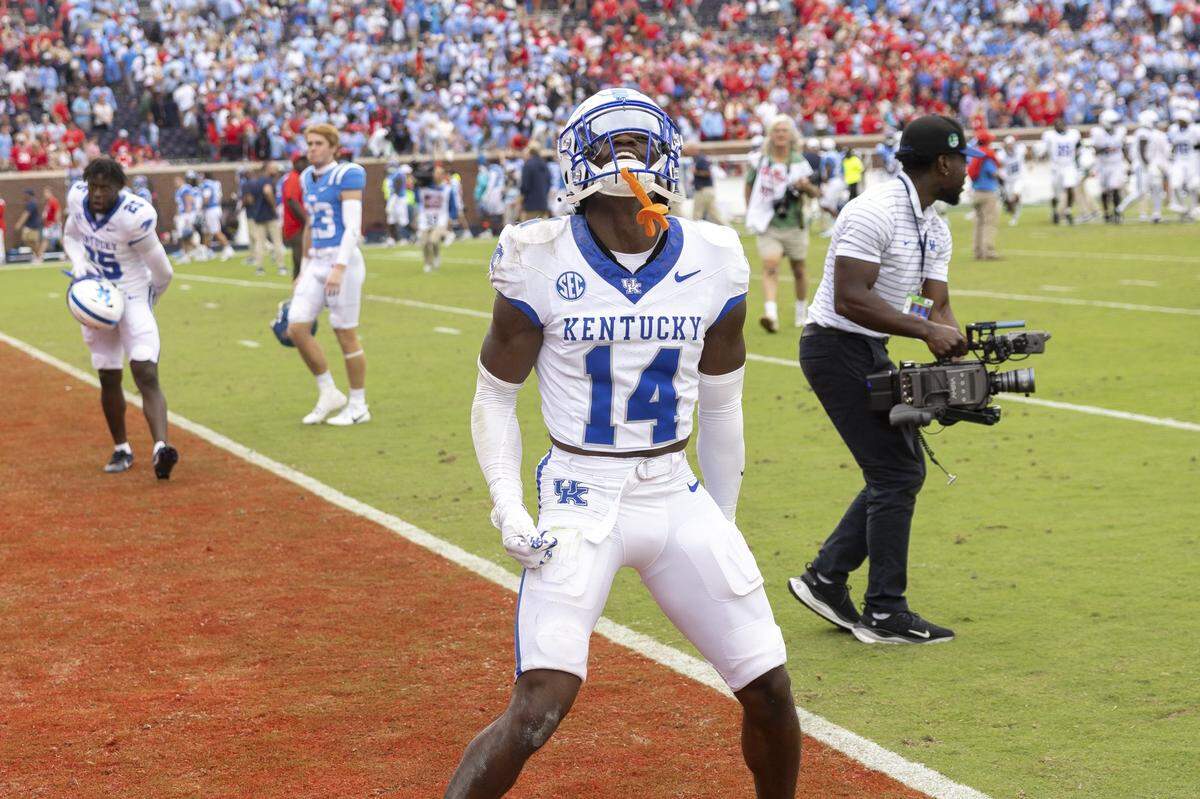 Kentucky defensive back Ty Bryant (14) reacts after Saturday’s 20-17 win at Ole Miss.
