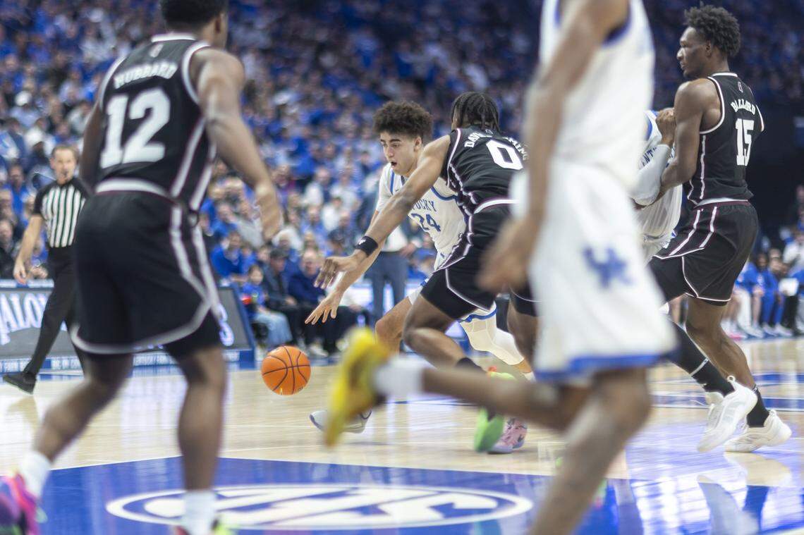 Kentucky basketball center Malachi Moreno (24) drives the ball as Mississippi State forward Jamarion Davis-Fleming (0) defends during a game at Rupp Arena in Lexington, Ky., on Saturday, Jan. 10, 2026.