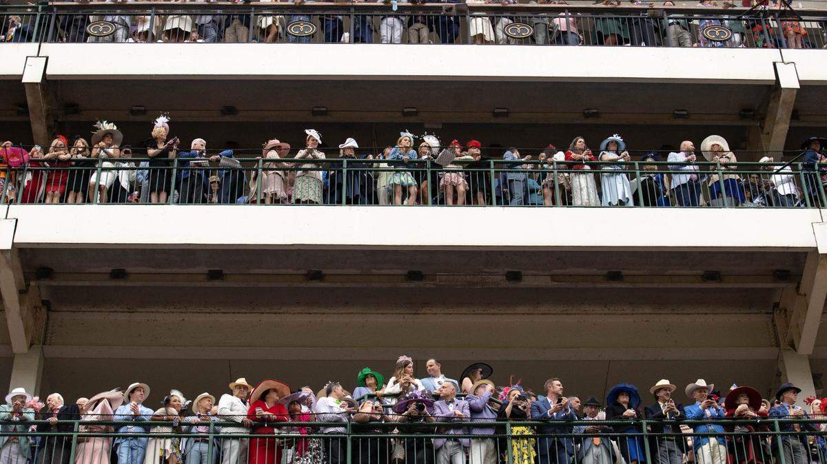 Attendees look out over the racetrack as they wait for the start of the 148th running of the Kentucky Derby at Churchill Downs in Louisville, Ky., Saturday, May 7, 2022. Here’s what you can bring inside the venue for Saturday’s event, plus road closures around the city. (Grace Ramey/photo@bgdailynews.com)