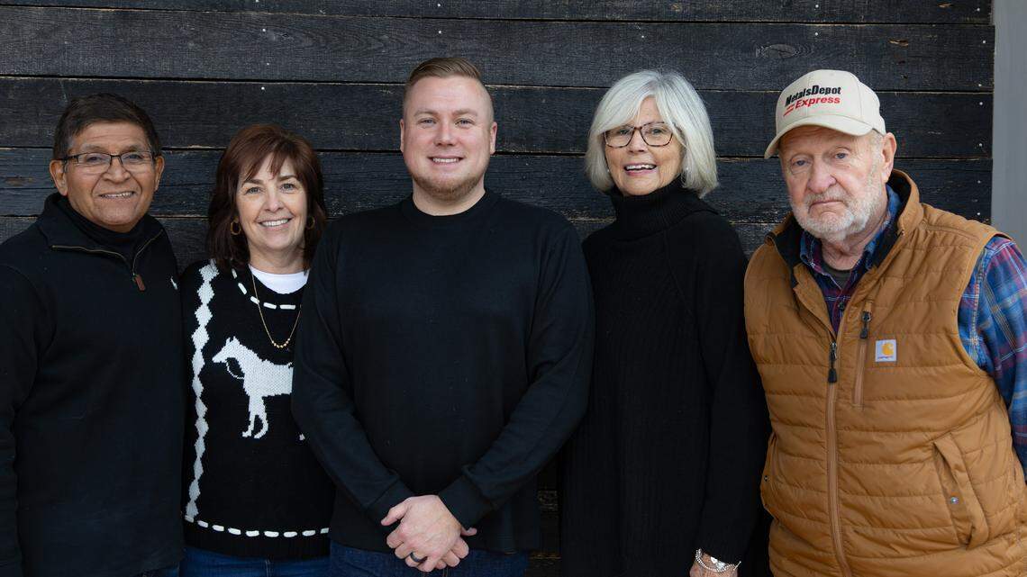 Co-Owners Joel and Jan Moncivaiz, Andy Embry, and Darrell and Debbie Poynter pose for a picture in the lobby area of Hotel Thoroughbred in downtown Paris, Ky, on Dec. 4, 2025.