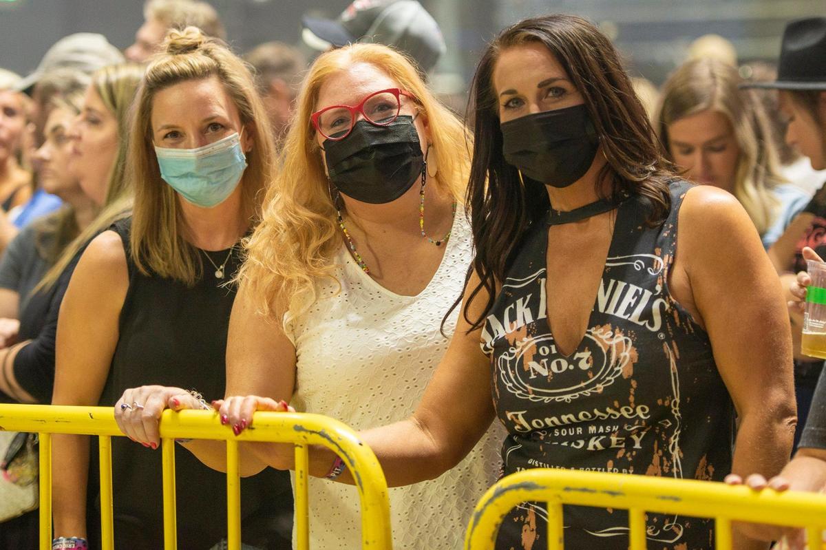 While most in attendance Eric Church’s country music show at Rupp Arena Sept. 17 were maskless, these fans choose to wear masks.