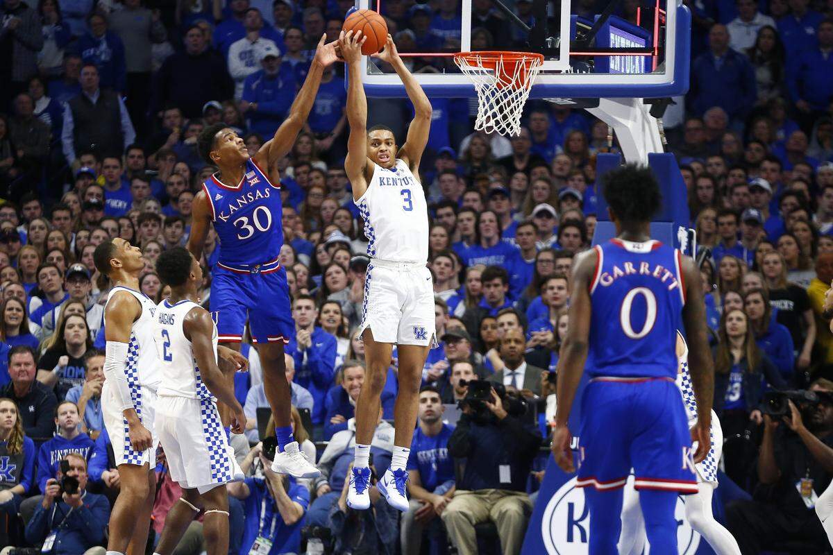 Kentucky’s Keldon Johnson grabbed a rebound against Kansas last Saturday in Rupp Arena. Dick Vitale said he likes Johnson’s “glide-and-slide ability.”