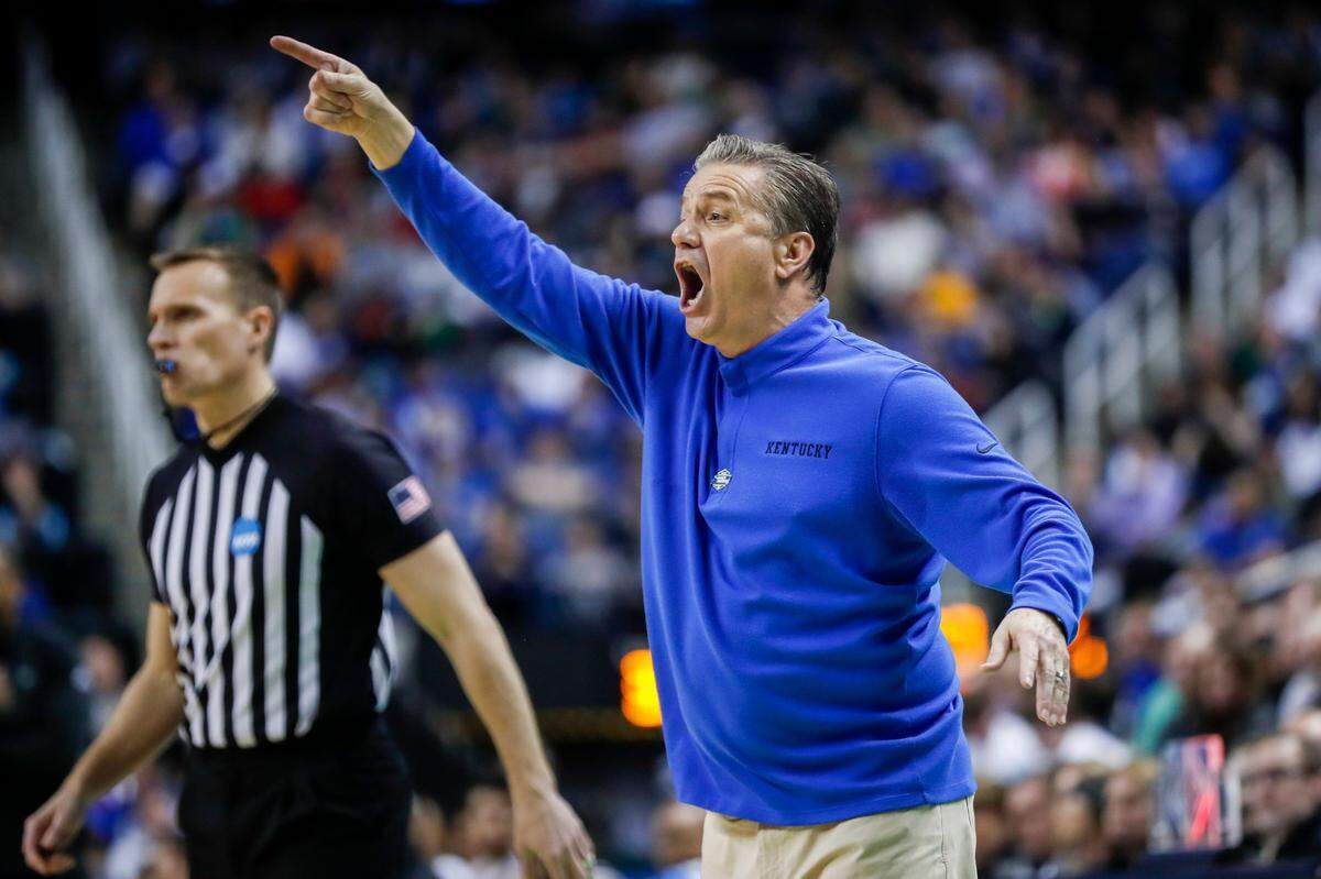 Kentucky head coach John Calipari calls to his players during an NCAA Tournament first-round game against Providence at Greensboro Coliseum on Friday.
