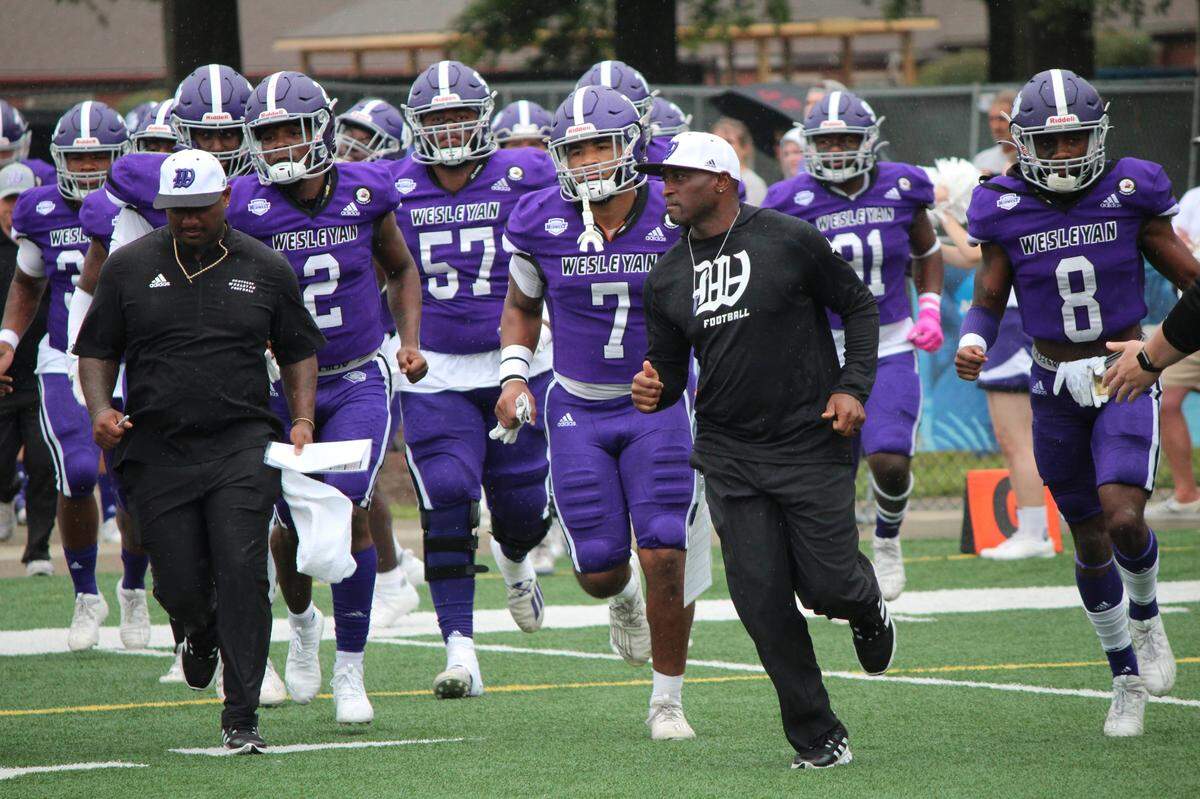 Craig Yeast, right of center, led Kentucky Wesleyan College in Owensboro for three seasons before being hired as the new coach of his hometown Mercer County High School Titans. Yeast played for the old Harrodsburg High School, which merged with Mercer in 2006.