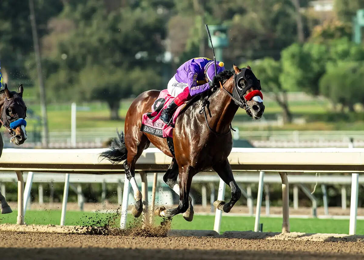 Frankie Dettori guides Raging Torrent to victory in the Grade 1 Malibu Stakes at Santa Anita Park in Arcadia, California, on Thursday.