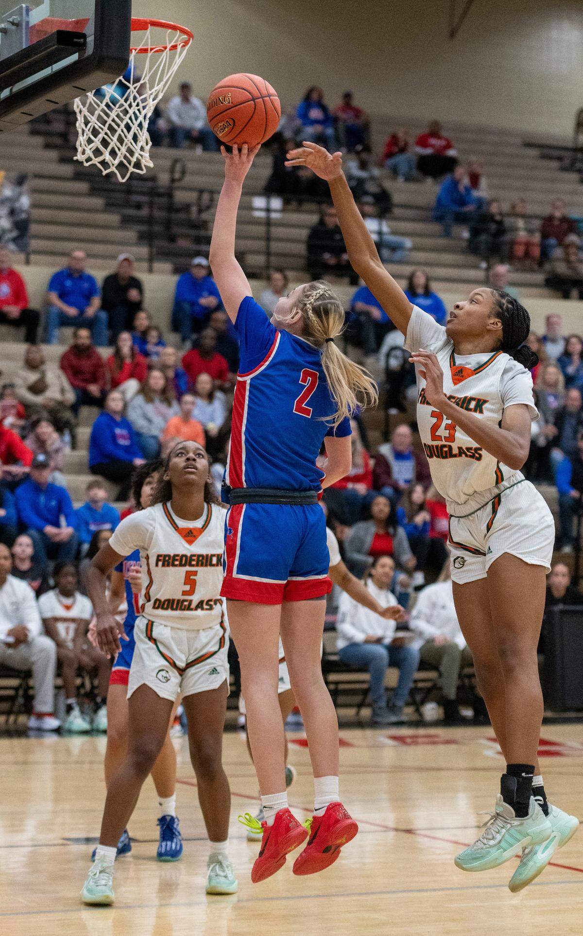 Madison Central’s Cameryn Ridderikhoff drives for two of her seven points in Saturday’s 11th Region Tournament finals.