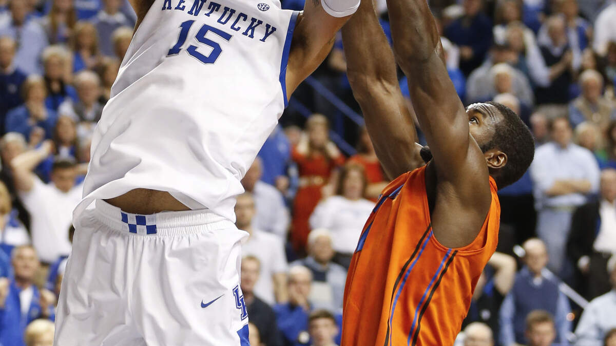 Kentucky Wildcats forward Willie Cauley-Stein (15) went up for a shot against Florida Gators center Patric Young (4) with no foul called as Kentucky defeated Florida 61-57 on Saturday March 9, 2013 in Lexington, Ky. Photo by Mark Cornelison | Staff