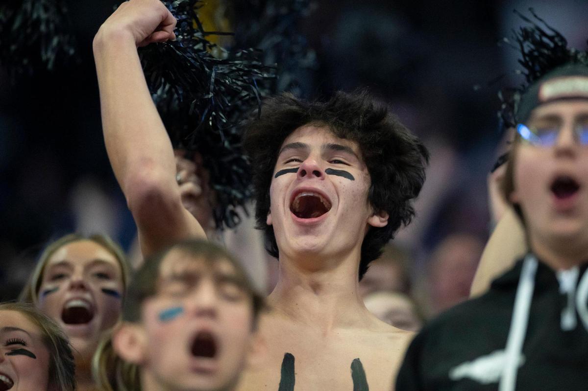 The North Oldham student section cheers during a game against Muhlenberg County at the 2022 UK HealthCare Boys’ Sweet 16 at Rupp Arena in Lexington, Ky., on Wednesday, March 16, 2022.