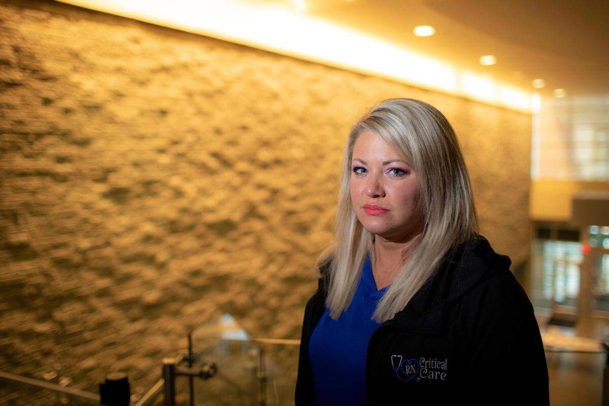 COVID ICU nurse Gena Lewis poses for a portrait at St. Joseph Health in London, Ky., Thursday, August 26, 2021. “Currently we don’t have any beds and most everyone in the ICU is on a ventilator, so it’s pretty scary right now,” Lewis said about the situation in the ICU with COVID right now.