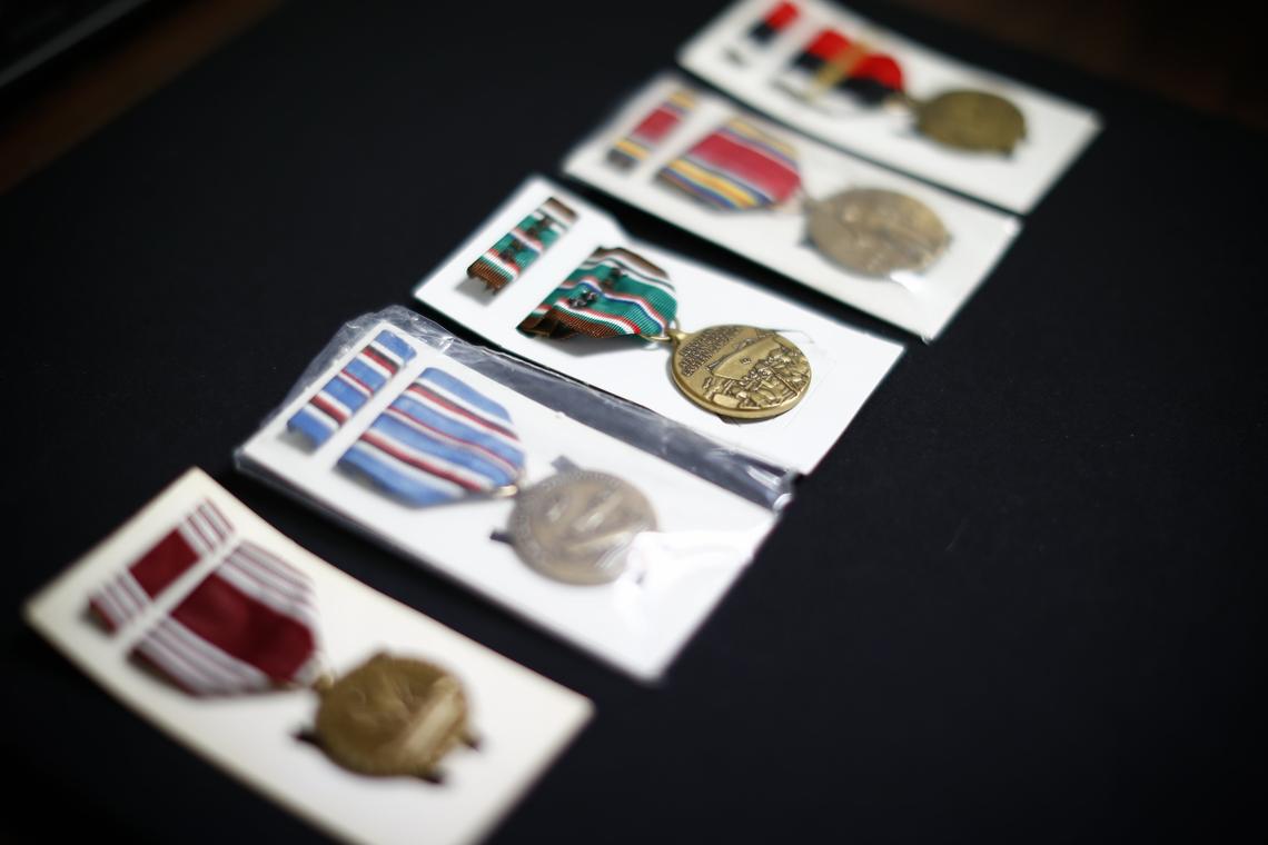 Unclaimed military medals including The Army Good Conduct Medal, from left, The American Campaign Medal, The European-African-Middle Eastern Campaign Medal, The World War II Victory Medal and The World War II Occupation Service Medal at the Kentucky State Treasurer’s office in Frankfort, Ky., Monday, May 20, 2019.