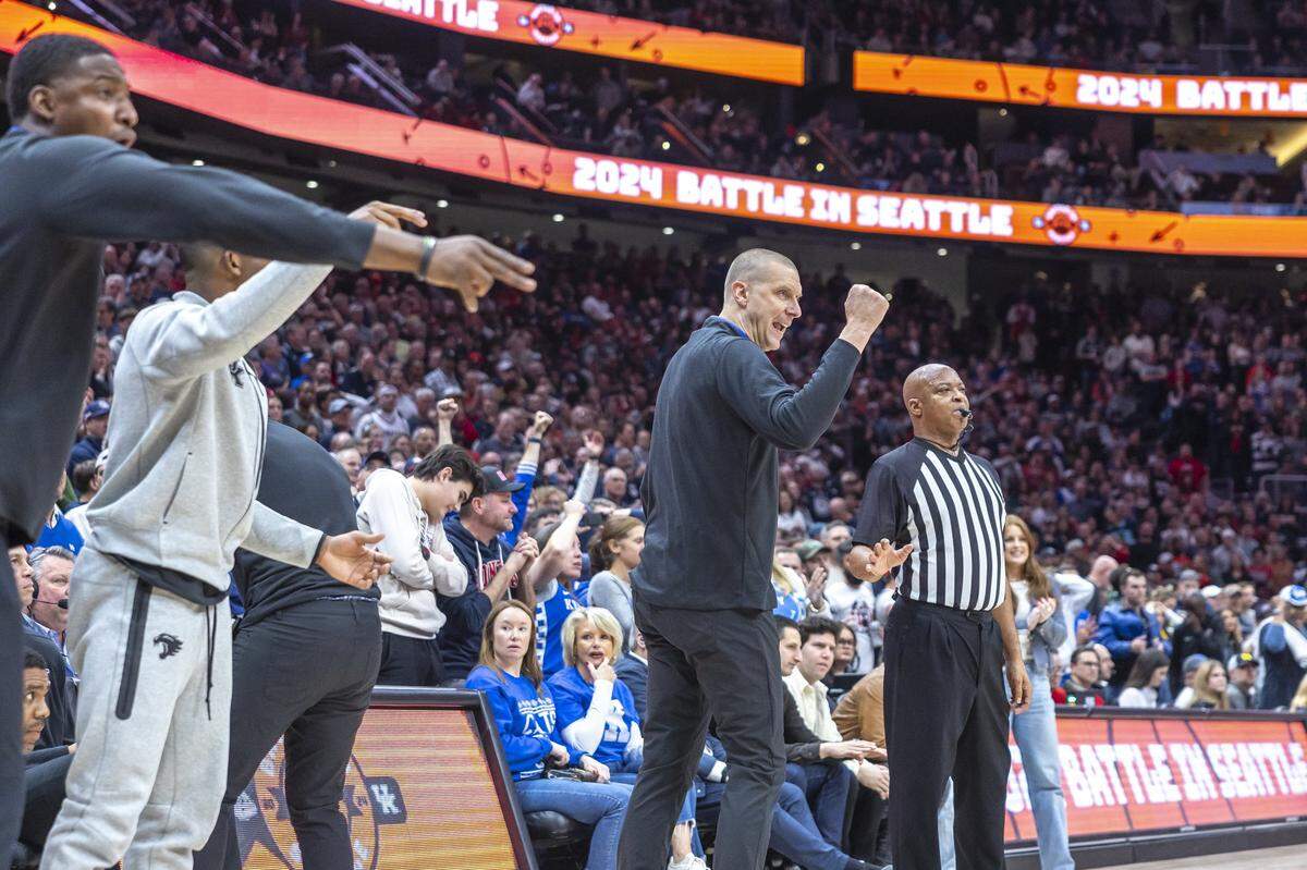 Kentucky head coach Mark Pope reacts during the Wildcats’ big second-half comeback against Gonzaga in Seattle on Saturday night.