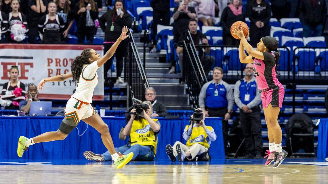 Assumption's Serae Bundrent-Palmer (24) puts up what would be the game-winning three-pointer over Frederick Douglass' Peighton Okorley (5) in the Rocket's 32-30 win in a second-round game in the 2026 Clark's Pump-N-Shop Girls' Basketball Sweet 16, Friday, March 13, 2026 at Rupp Arena in Lexington, Ky.