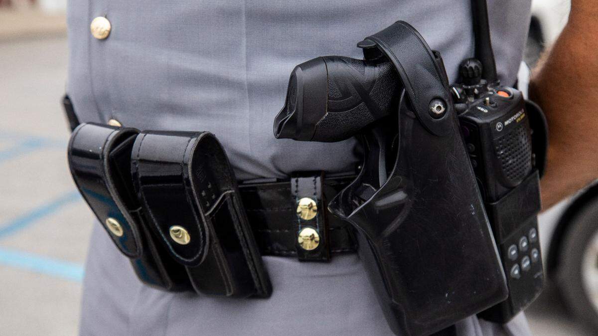 Kentucky State Police officer taser on utility belt.