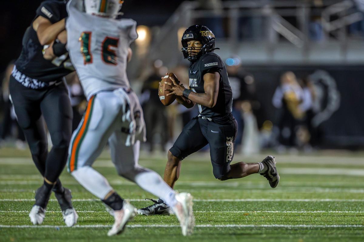 Boyle County’s Montavin Quisenberry (5) looks to pass against Frederick Douglass at Boyle County High School in Danville, Ky., on Friday.