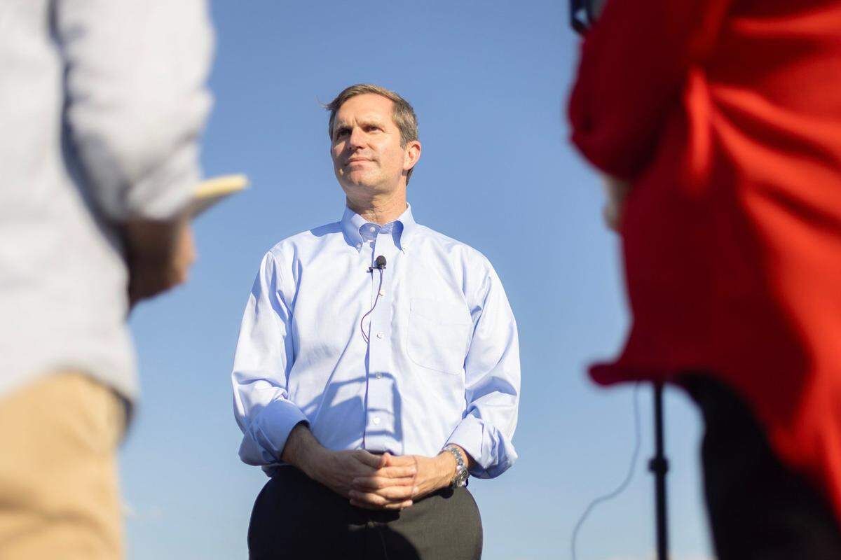 Kentucky Gov. Andy Beshear, who is running for reelection, speaks to reporters following a ribbon cutting ceremony celebrating the completion of a new section of U.S. Highway 641 between Murray and the Kentucky-Tennessee state line in Hazel, Ky., on Thursday, Oct. 12, 2023.