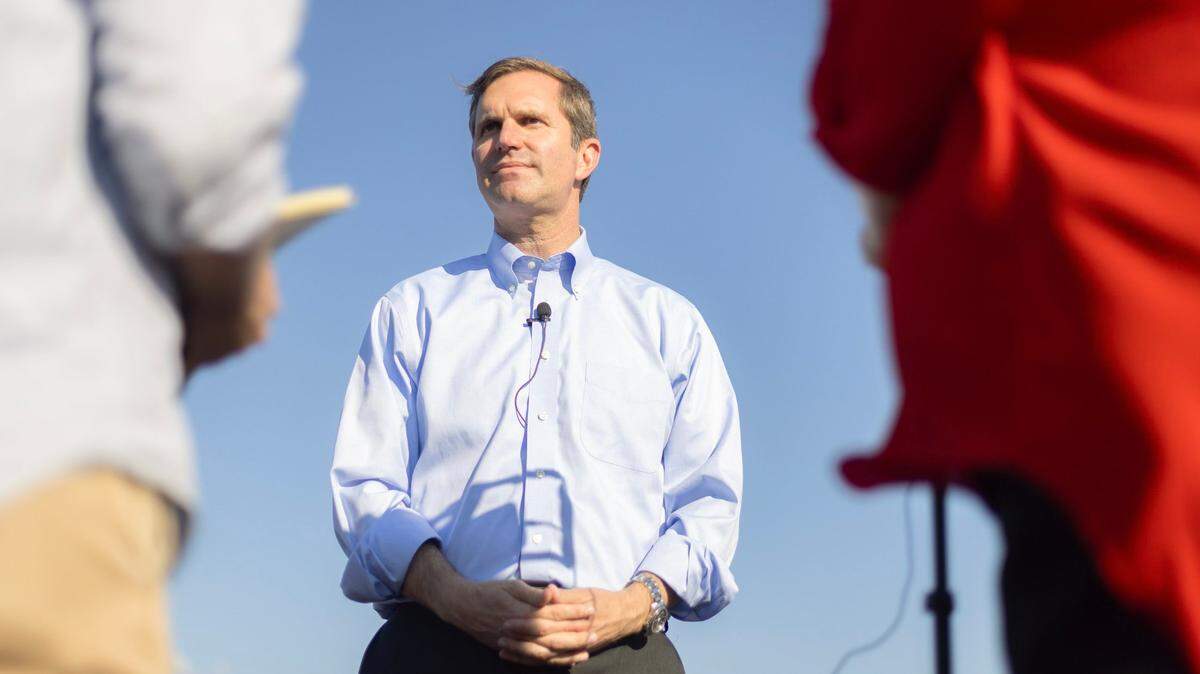 Kentucky Gov. Andy Beshear, who is running for reelection, speaks to reporters following a ribbon cutting ceremony celebrating the completion of a new section of U.S. Highway 641 between Murray and the Kentucky-Tennessee state line in Hazel, Ky., on Thursday, Oct. 12, 2023.