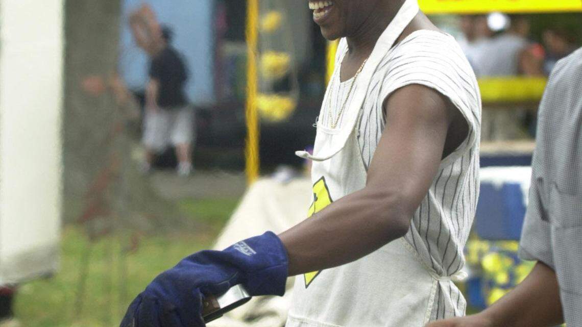 Mamadou "Sav" Savané, shown here at a Woodland Arts Fair, is recovering from burns he sustained while cooking.
