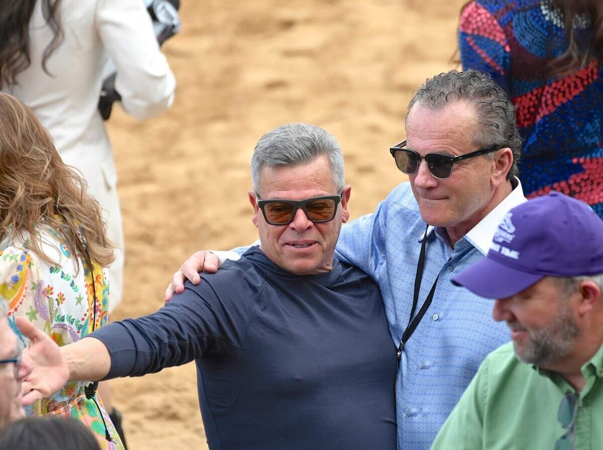 Anthony Valinoti and John Sikura together at a racetrack. Sikura said he is a big fan of Valinoti and his restaurant, Deluca’s Pizza.
