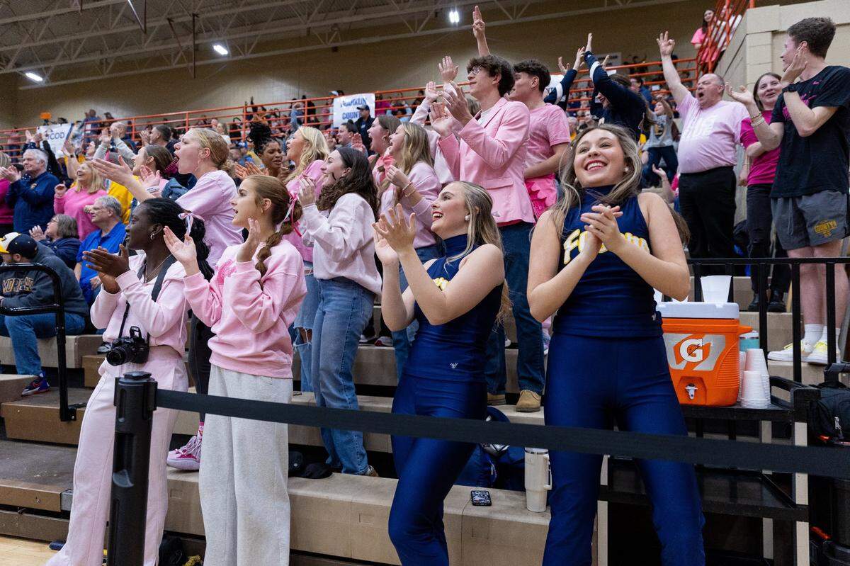 Franklin County students cheer on the Flyers during the 11th Region finals against Frederick Douglass at Paul Laurence Dunbar on Saturday.