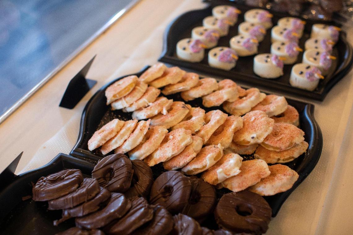 Strawberry shortcake chocolate covered pineapples and chocolate covered pineapples on display at the Side Porch Cafe in Waco Ky., Thursday, February 25, 2021. Every month the bakery tries to do seasonal themed weeks with sweet treats and baked goods like Valentines, Carnival, Harry Potter and Grinch week.