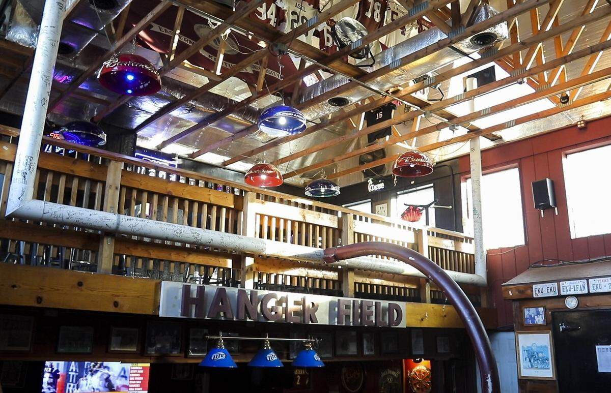 The centerpiece of EKU sports memorabilia in the ‘Colonel Dome’ at Madison Garden Bar and Grill in Richmond is a goal post from from football coach Roy Kidd’s 300th win at the school. The post was disassembled and then put back together inside the restaurant.