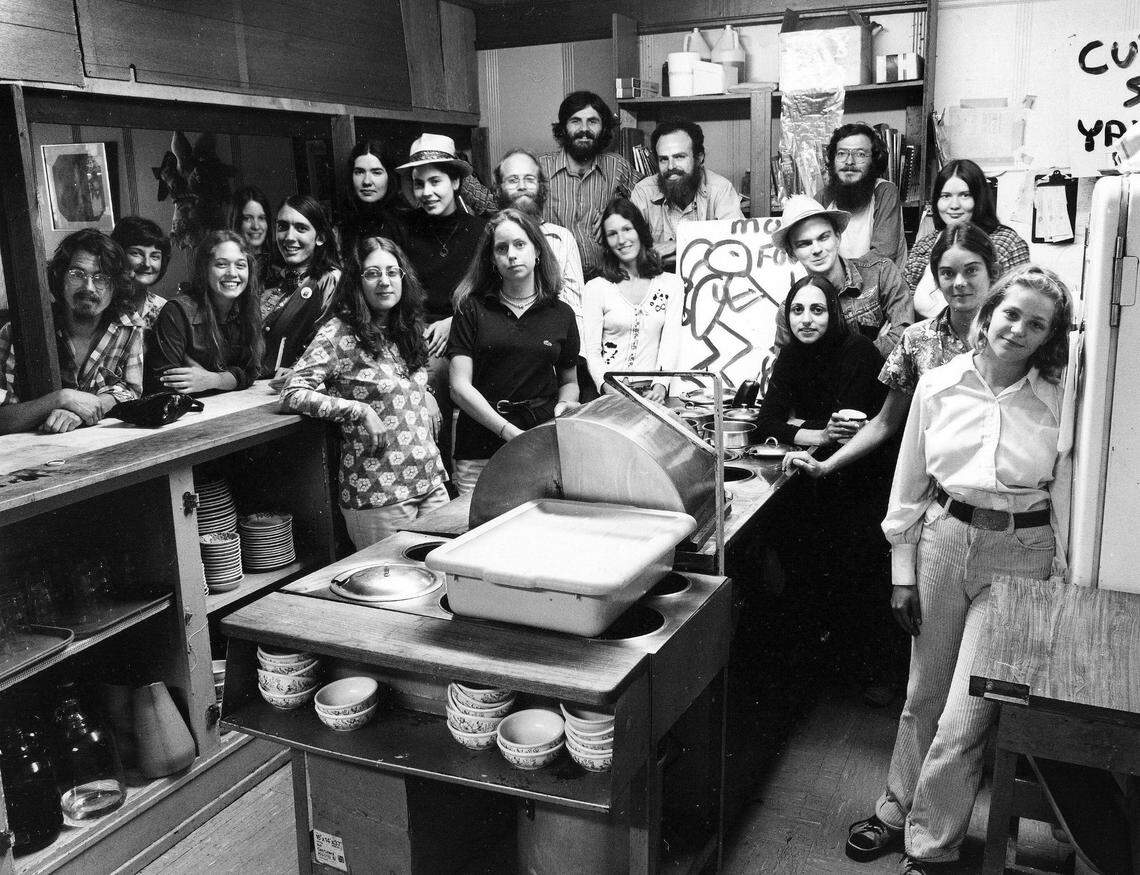 Alfalfa staff members photographed in 1974, the year after the restaurant opened. Among the owners at the time were, left to right, Marina McCulloch (wearing hat), Leslie Bower (front left in dark shirt), Artie Howard (tallest in back, with beard), Lucia Walls (front right in dark shirt) and Ann “Panny” Hobson (right center). Photo by Guy Mendes