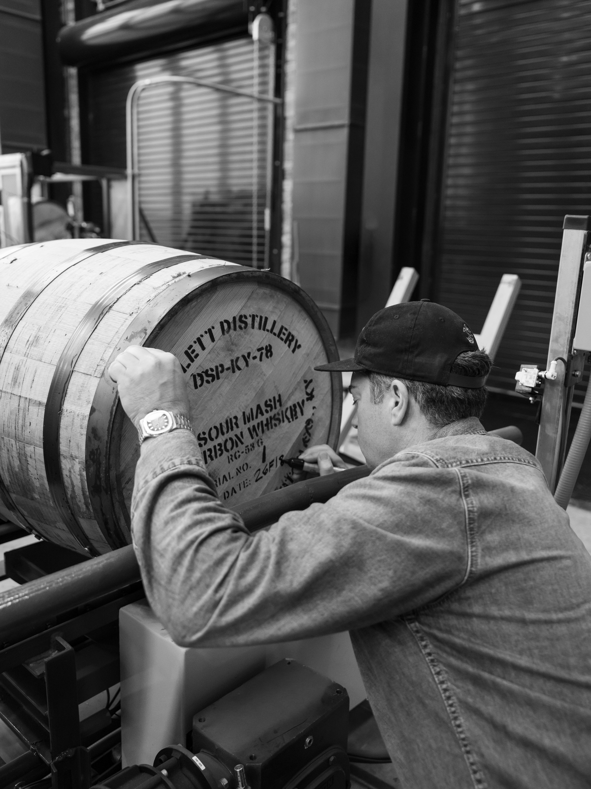 Master distiller Drew Kulsveen filled the first barrel at the new Willett Distillery in Springfield on June 18, the birthday of his late mother, Martha Willett Kulsveen.