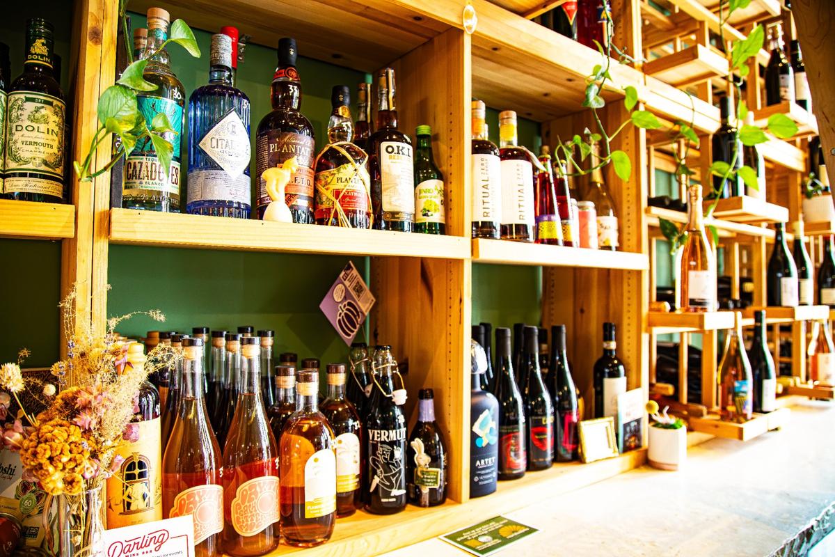 An assortment of wines and spirits on display at Darling Wine Bar in Greyline Station on March 20, 2025 in Lexington, Ky. The wine bar opened in 2023.
