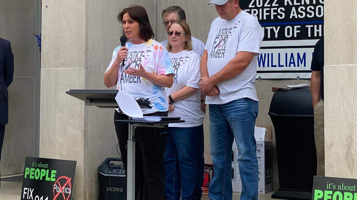 Debbie Hall, Amber Spradlin’s cousin, speaks to a crowd about Spradlin’s murder during a press conference at the Floyd County Courthouse June 29, 2023. Hall announced her candidacy for judge-executive Monday.