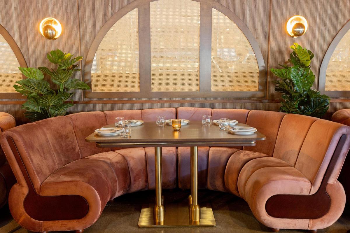 Custom made velvet booths in the dining room of Mileta restaurant at Fayette Mall. Co-owner Dallas Rose said he is happy that people like the dining room. “I wanted to make a place where you want to take a picture of yourself, or have yourself photographed. And we see a lot of that happening,” said Rose.