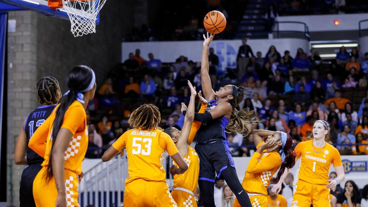 Kentucky guard Robyn Benton (1) drives to the basket against Tennessee during Sunday’s game at Memorial Coliseum. She scored 17 points for the Wildcats.