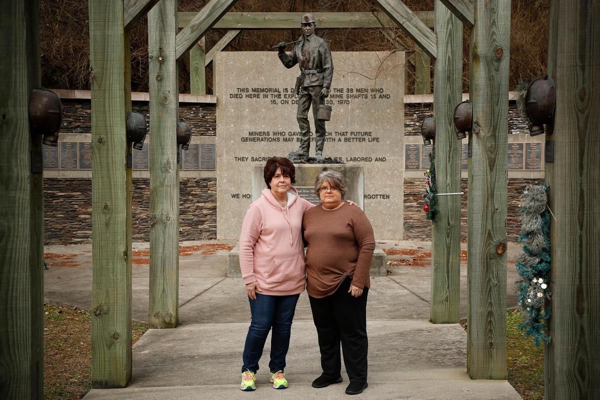 Joan Gray, of Goose Rock, Ky., left, and her sister Debbie Edwards, of Manchester, Ky., lost their father Jeff Spurlock and uncle Theo Griffin shortly after noon on Dec. 30, 1970, in the Hurricane Mine explosion, Wednesday, Dec. 30, 2020. Gray was 15 and Edwards was 12 when they received the news their father and uncle were killed along with 26 other coal miners in the explosion.