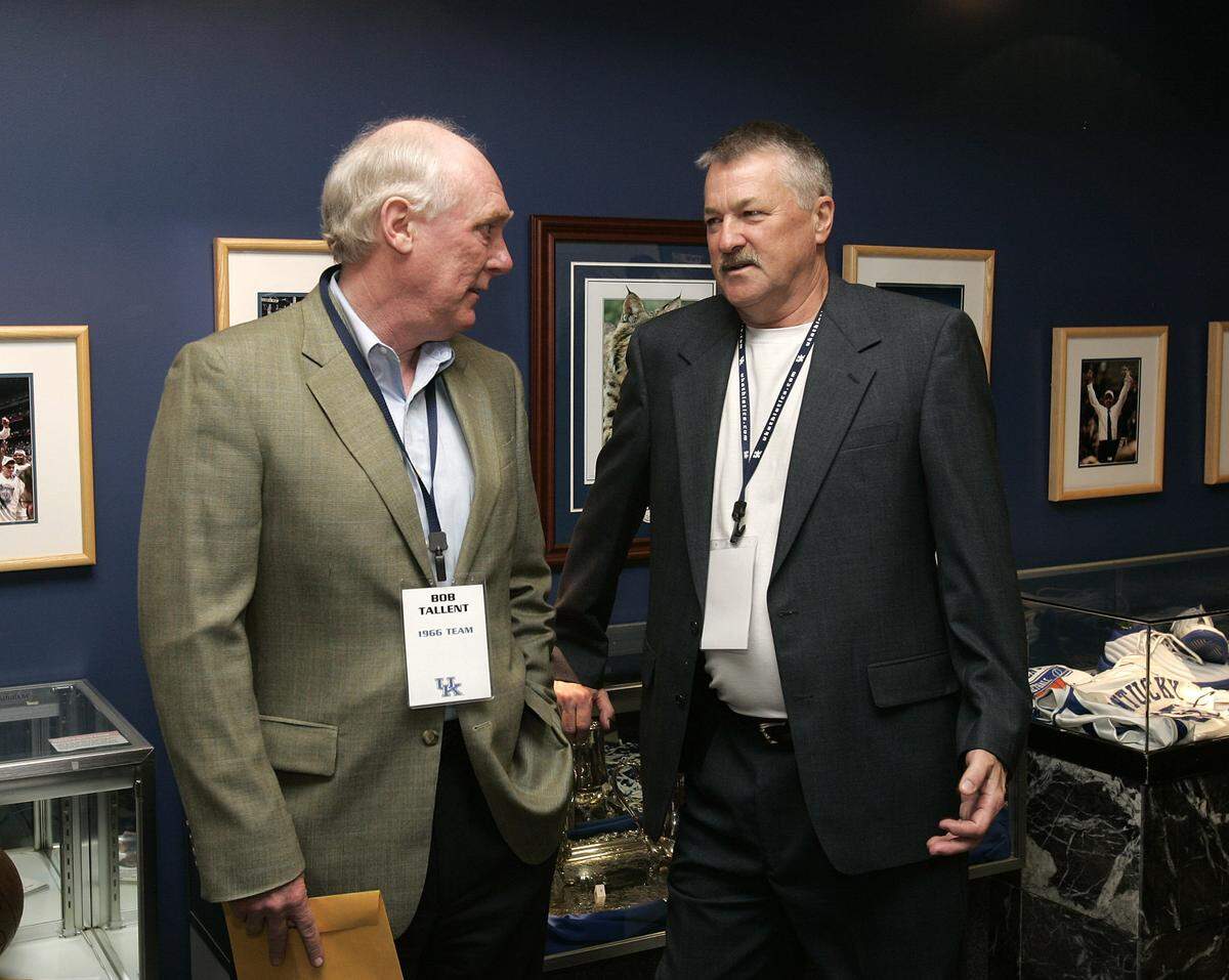Bob Tallent, left, and Louie Dampier, right, spoke during a reception honoring Rupp’s Runts, the 1965-66 UK basketball team.