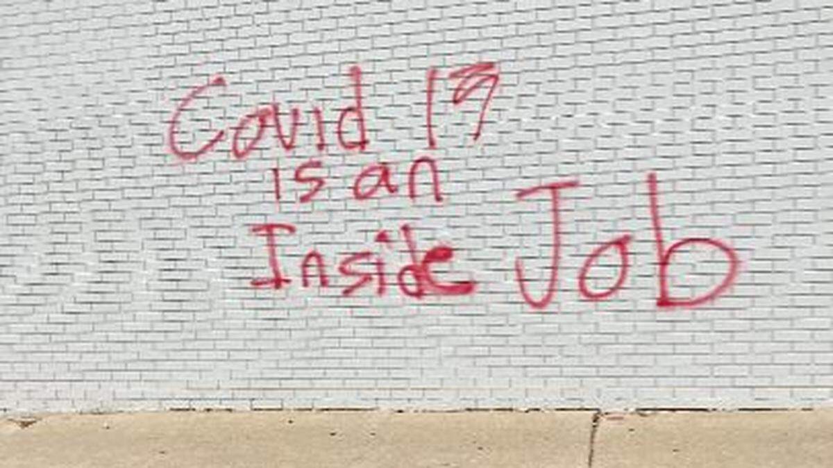 The phrase “COVID 19 is an inside job” was spray-painted on the Urgent Care building on Nicholasville Road in Lexington. The graffiti was found by employees Monday morning, a manager said.