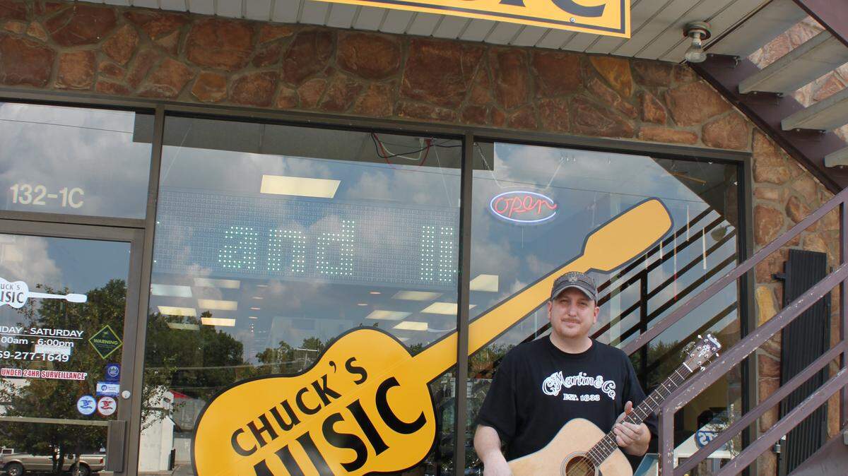  Jesse Taylor is manager and co-owner of Chuck's Music on Southland Drive. Photo by Vicky Broadus/Staff