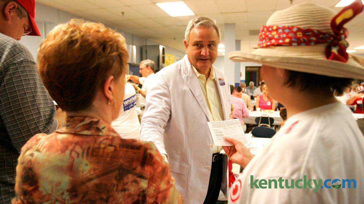 Former Republican gubernatorial candidate Larry Forgy spoke to Gail Russell, left, and Donna Maria Walker at the Graves County Republican breakfast in Mayfield on the morning of the 2006 Fancy Farm political picnic. The two annual events are a few miles apart.